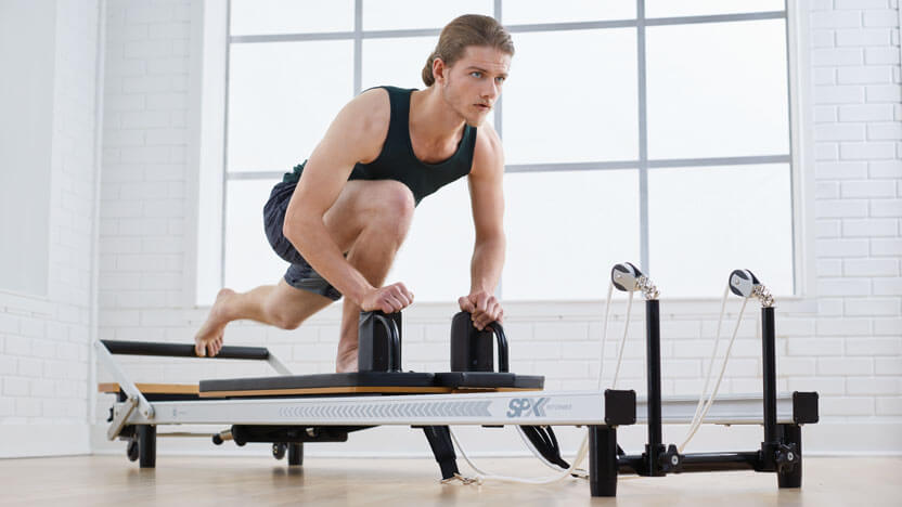 Elevating the Basics: The Power of Accessory Gear in Beginner Reformer Pilates